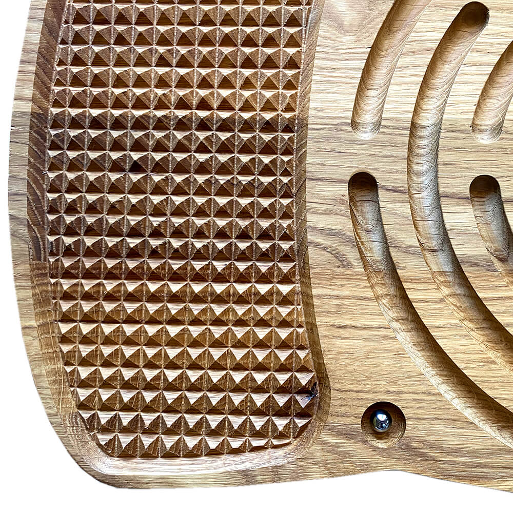 Detailed view of the sacred labyrinth design on the Neuro Balance Board, emphasizing the sacred geometry.