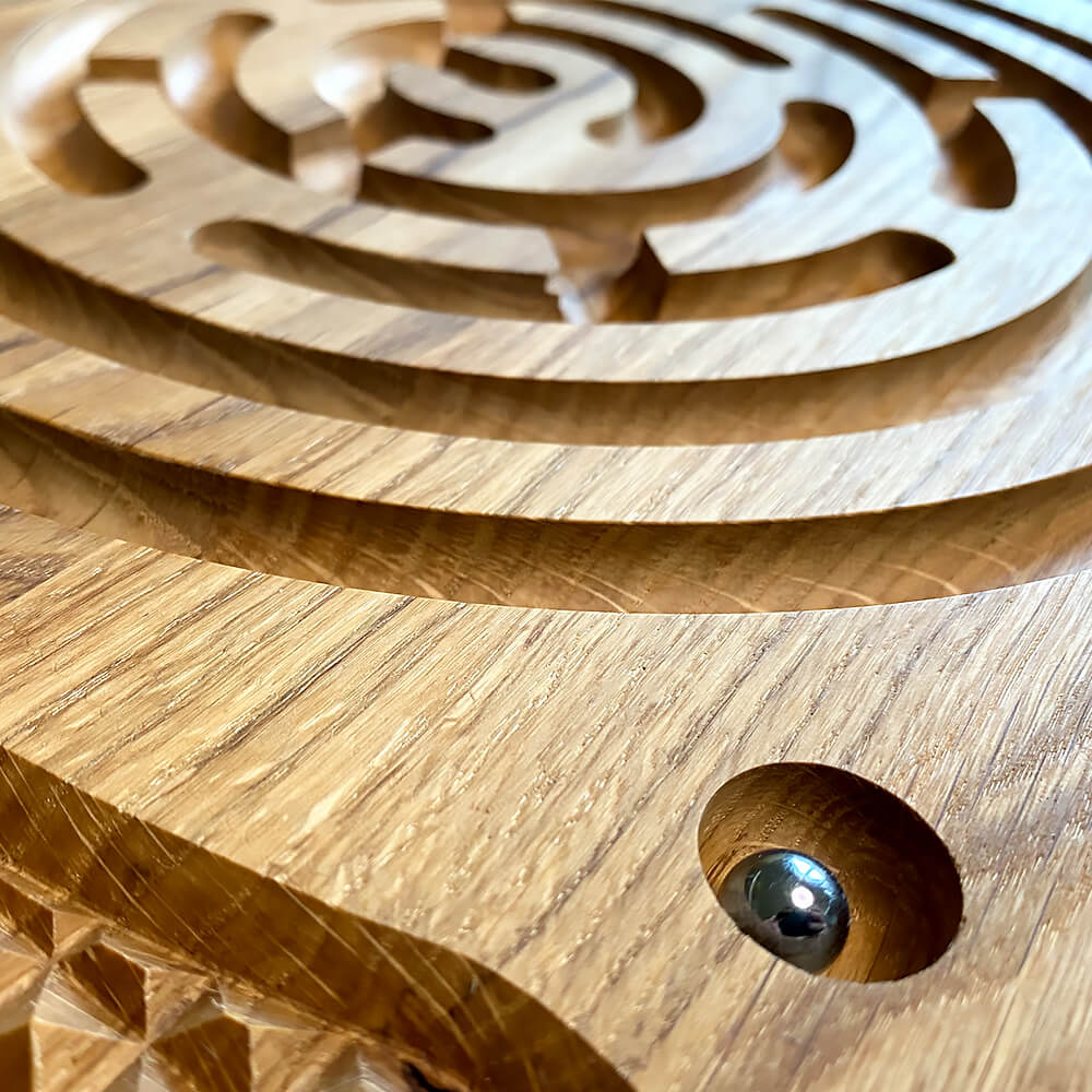 Hand-finished oak wood of the ‘Sacred Labyrinth’ Neuro Balance Board, showcasing fine craftsmanship and attention to detail.