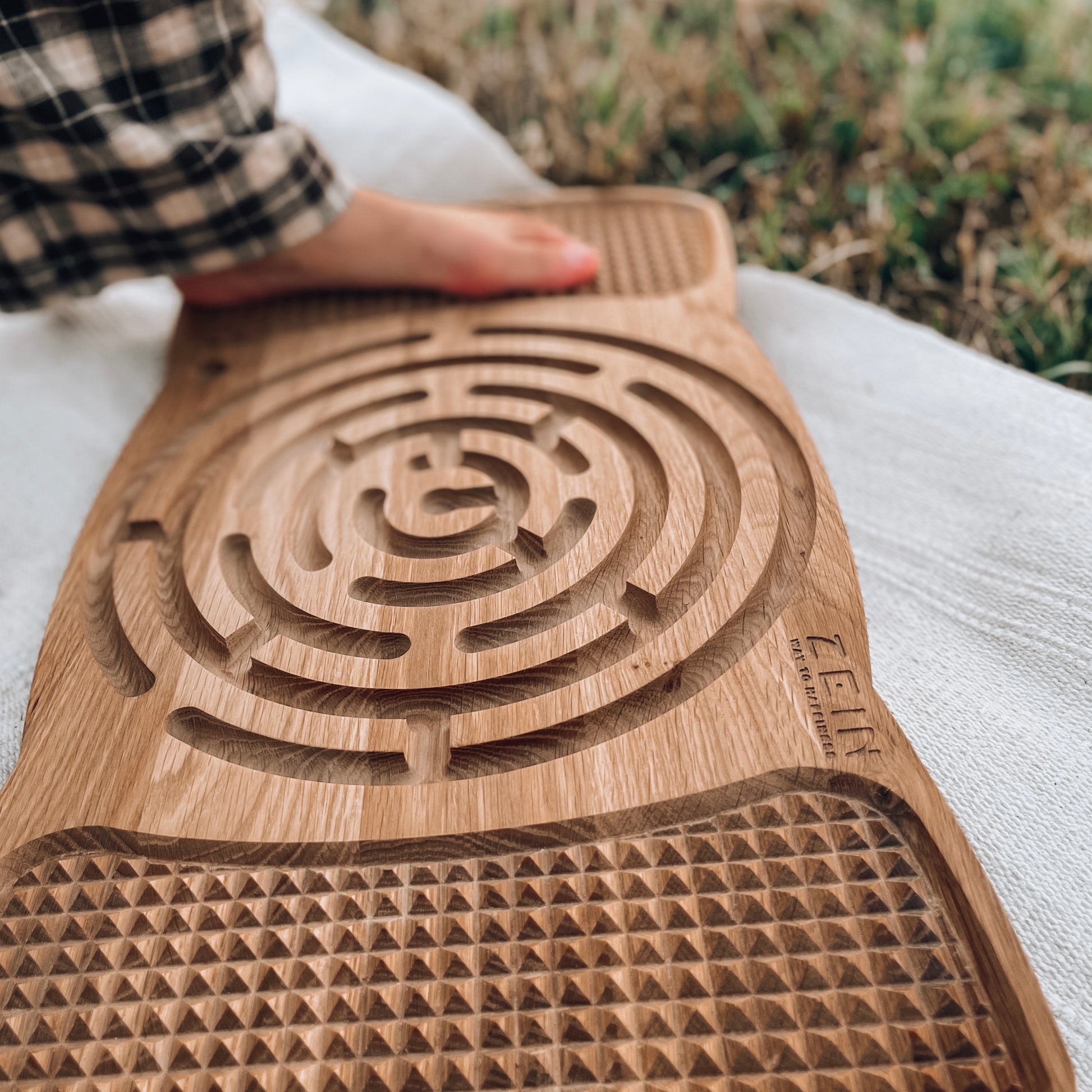 Close-up of the textured surface of the ‘Sacred Labyrinth’ Neuro Balance Board, designed for foot reflexology.