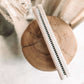 Close-up of durable and evenly spaced nails on the Sadhu nail board.