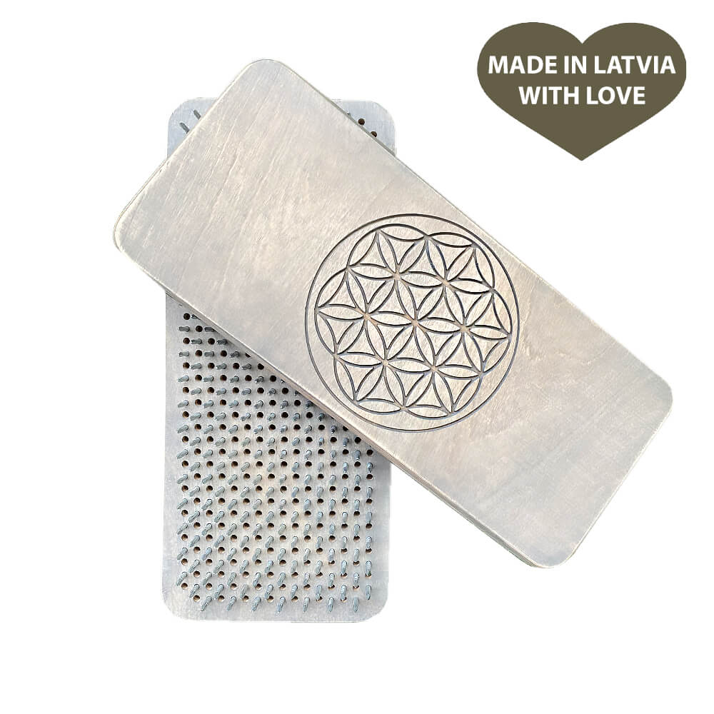 Sadhu board with Flower of Life design for meditation and yoga.