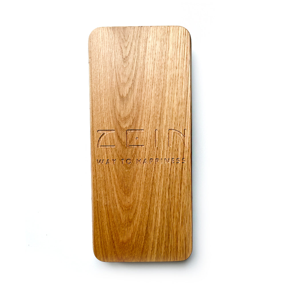 Backside ofPremium oak wood board is decorated with our slogan Zein - way to happiness